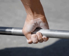 The hook grip, demonstrated. Notice the thumb tucked under the fingers.